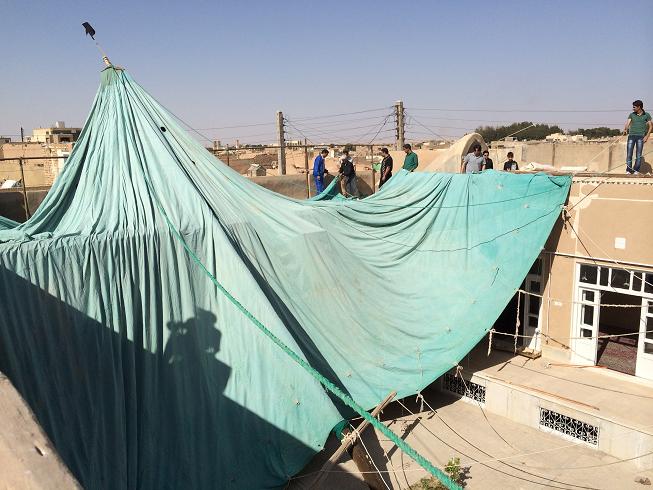 علیرضا پویافر  گزارش تصویری: برافراشتن پوشش امام حسینی خانه مرتاضیه بیش از پنجاه سال